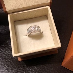 5.15 ct Moissanite 3 stone emerald cut ring